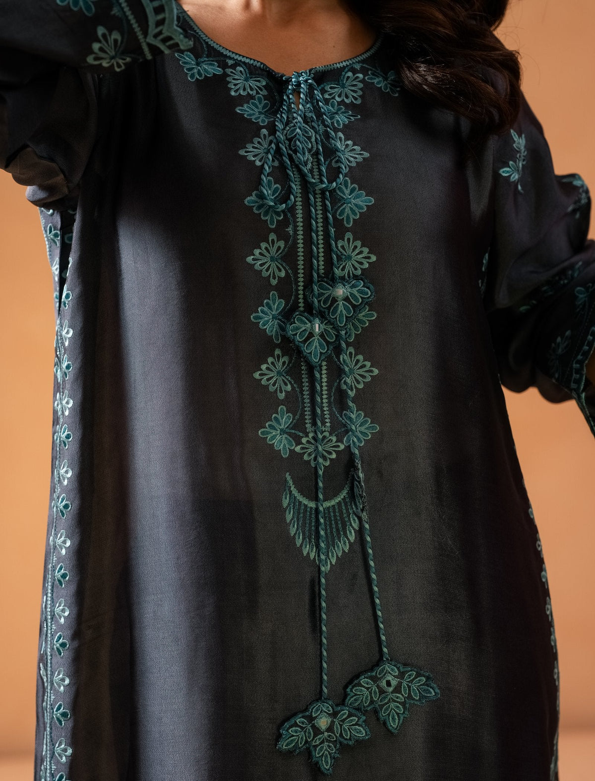 Grey Kaftaan - teal embroidered neckline and tassel tie close-up