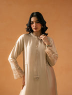 Ivory Kaftaan - tasseled neckline and scalloped cutwork cuffs